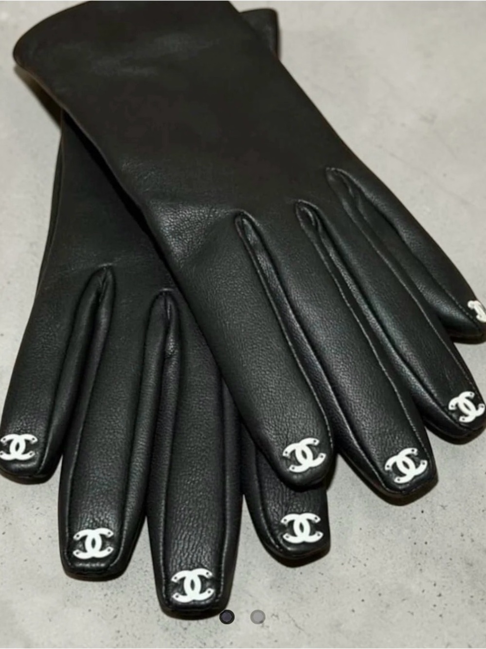 CHANEL Chic Black Leather Gloves with White Logo Accent